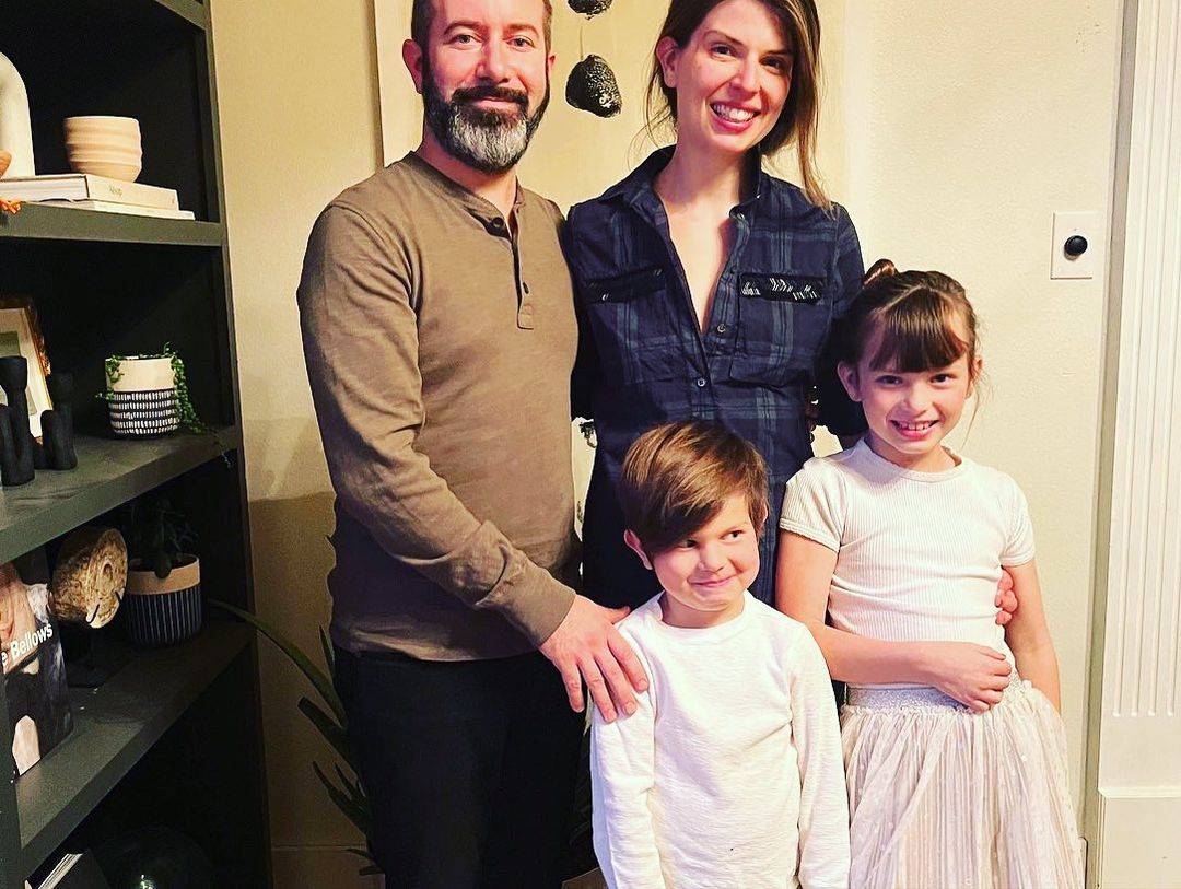 Hannah with Tim and children celebrating Thanksgiving event with her dad and the family.